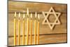 Hanukkah Candle on Wooden Background-Yastremska-Mounted Photographic Print