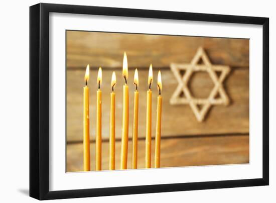 Hanukkah Candle on Wooden Background-Yastremska-Framed Photographic Print