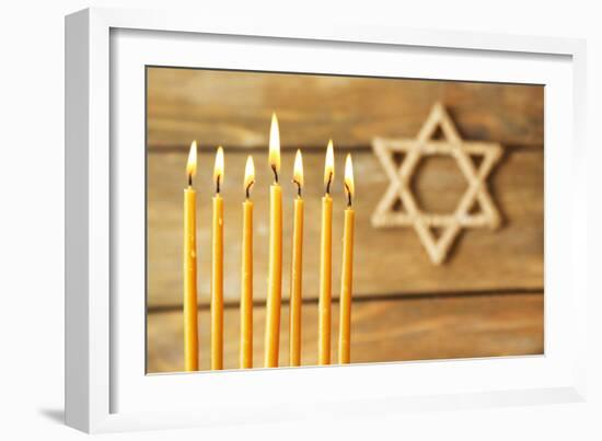 Hanukkah Candle on Wooden Background-Yastremska-Framed Photographic Print