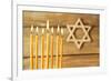 Hanukkah Candle on Wooden Background-Yastremska-Framed Photographic Print