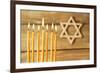 Hanukkah Candle on Wooden Background-Yastremska-Framed Photographic Print