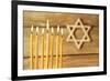 Hanukkah Candle on Wooden Background-Yastremska-Framed Photographic Print