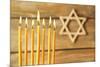 Hanukkah Candle on Wooden Background-Yastremska-Mounted Photographic Print