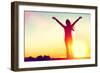 Happy Celebrating Winning Success Woman at Sunset or Sunrise Standing Elated with Arms Raised up Ab-Maridav-Framed Photographic Print