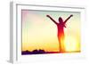 Happy Celebrating Winning Success Woman at Sunset or Sunrise Standing Elated with Arms Raised up Ab-Maridav-Framed Photographic Print