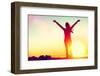 Happy Celebrating Winning Success Woman at Sunset or Sunrise Standing Elated with Arms Raised up Ab-Maridav-Framed Photographic Print