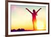 Happy Celebrating Winning Success Woman at Sunset or Sunrise Standing Elated with Arms Raised up Ab-Maridav-Framed Photographic Print