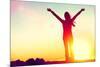 Happy Celebrating Winning Success Woman at Sunset or Sunrise Standing Elated with Arms Raised up Ab-Maridav-Mounted Photographic Print