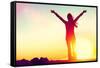 Happy Celebrating Winning Success Woman at Sunset or Sunrise Standing Elated with Arms Raised up Ab-Maridav-Framed Stretched Canvas