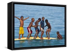 Happy Children Playing on the Beach of Savo Island, Solomon Islands, Pacific-Michael Runkel-Framed Stretched Canvas