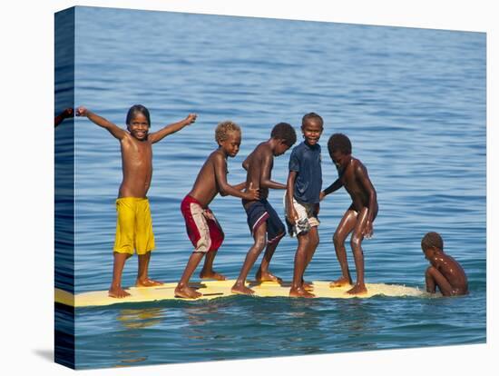 Happy Children Playing on the Beach of Savo Island, Solomon Islands, Pacific-Michael Runkel-Stretched Canvas