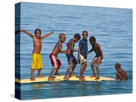 Happy Children Playing on the Beach of Savo Island, Solomon Islands, Pacific-Michael Runkel-Stretched Canvas