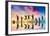 Happy Group Of Friends, Family With Dog And Cat Jumping Together At Sunset, Water Reflection-Michal Bednarek-Framed Art Print