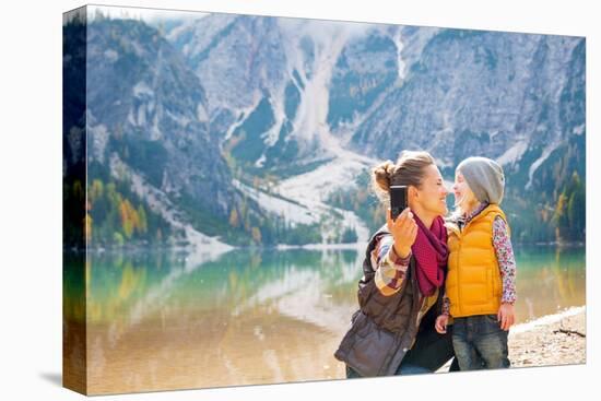 Happy Mother and Baby Making Selfie on Lake Braies in South Tyrol, Italy-Mr Alliance-Stretched Canvas