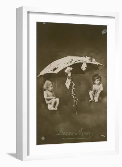 Happy New Year Card with Two Babies Hanging from an Umbrella, Sent in 1913-French Photographer-Framed Giclee Print