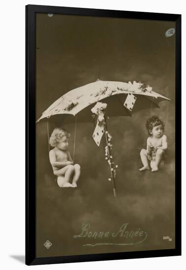 Happy New Year Card with Two Babies Hanging from an Umbrella, Sent in 1913-French Photographer-Framed Giclee Print