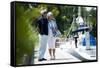 Happy Senior Couple Walking on a Dock in Summer-stefanolunardi-Framed Stretched Canvas