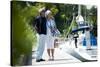 Happy Senior Couple Walking on a Dock in Summer-stefanolunardi-Stretched Canvas