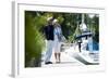 Happy Senior Couple Walking on a Dock in Summer-stefanolunardi-Framed Photographic Print