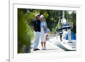 Happy Senior Couple Walking on a Dock in Summer-stefanolunardi-Framed Photographic Print