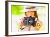 Happy Young Girl With Camera Outdoors-chesterf-Framed Art Print