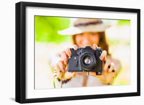 Happy Young Girl With Camera Outdoors-chesterf-Framed Art Print