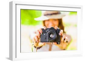 Happy Young Girl With Camera Outdoors-chesterf-Framed Art Print