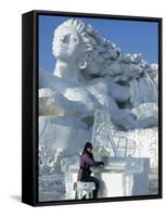 Harbin City, A Tourist Is Playing a Sculpted Ice Piano, Snow and Ice Festival, China-Christian Kober-Framed Stretched Canvas