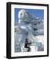 Harbin City, A Tourist Is Playing a Sculpted Ice Piano, Snow and Ice Festival, China-Christian Kober-Framed Photographic Print