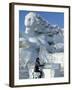 Harbin City, A Tourist Is Playing a Sculpted Ice Piano, Snow and Ice Festival, China-Christian Kober-Framed Photographic Print