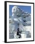 Harbin City, A Tourist Is Playing a Sculpted Ice Piano, Snow and Ice Festival, China-Christian Kober-Framed Photographic Print