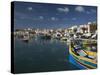 Harbor and Traditional Luzzu Fishing Boats, Marsaxlokk, Malta-Walter Bibikow-Stretched Canvas