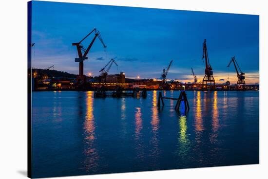 Harbour cranes at dusk, Gothenburg, province of Västra Götalands län, Swede-Andrea Lang-Stretched Canvas