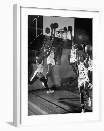 Harlem Globetrotters Playing in a Basketball Game-J^ R^ Eyerman-Framed Premium Photographic Print