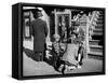 Harlem Street Scene Showing a Man Getting a Shoeshine as a Young Child Watches Intently-null-Framed Stretched Canvas