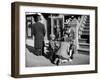 Harlem Street Scene Showing a Man Getting a Shoeshine as a Young Child Watches Intently-null-Framed Photographic Print