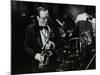 Harry Bence Playing the Saxophone at the Forum Theatre, Hatfield, Hertfordshire, 1984-Denis Williams-Mounted Photographic Print