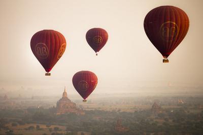 Aerial View of Balloons over Ancient Temples of Bagan at Sunrise in Myanmar