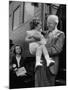 Harry Truman Holding up 3 Yr Old Suzanne Bump after the Town's Postmaster Pressed Her into Service-Hank Walker-Mounted Photographic Print