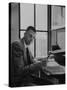 Harvard University Professor John Kenneth Galbraith Sitting in a Harvard Library-Dmitri Kessel-Stretched Canvas