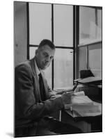 Harvard University Professor John Kenneth Galbraith Sitting in a Harvard Library-Dmitri Kessel-Mounted Premium Photographic Print