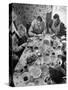 Harvest Farm Hands Eating Lunch Served by Their Wives in Kitchen of Farmhouse-Alfred Eisenstaedt-Stretched Canvas