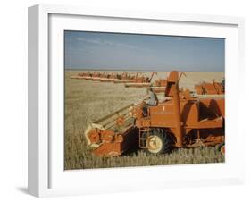 Harvest Story: Combines Harvest Wheat at Ranch in Texas-Ralph Crane-Framed Photographic Print