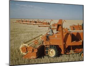 Harvest Story: Combines Harvest Wheat at Ranch in Texas-Ralph Crane-Mounted Photographic Print