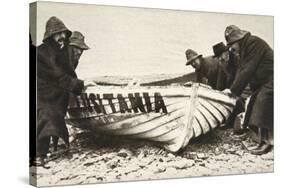 Hauling one of the 'Lusitania's' lifeboats onto the beach, Ireland, 8 May 1915-Clarke & Hyde-Stretched Canvas