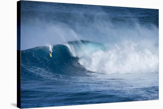 Hawaii, Maui. Kai Lenny Surfing Monster Waves at Pe'Ahi Jaws, North Shore Maui-Janis Miglavs-Stretched Canvas