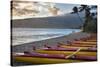 Hawaii, Maui, Kihei. Outrigger canoes on Kalae Pohaku beach and palm trees.-Janis Miglavs-Stretched Canvas