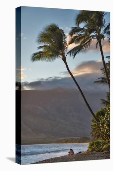 Hawaii, Maui, Kihei. Tourists walking under palm trees on Kalae Pohaku beach.-Janis Miglavs-Stretched Canvas