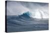 Hawaii Maui. Kyle Lenny Surfing Monster Waves at Pe'Ahi Jaws-Janis Miglavs-Stretched Canvas