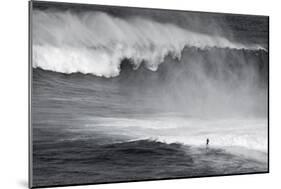 Hawaii, Maui. Lone Figure Surfing Monster Waves at Pe'Ahi Jaws, North Shore Maui-Janis Miglavs-Mounted Photographic Print